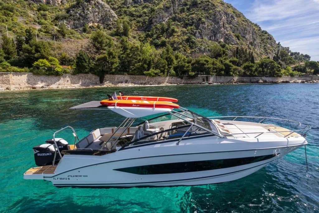 Motorboat anchored in crystal clear cove