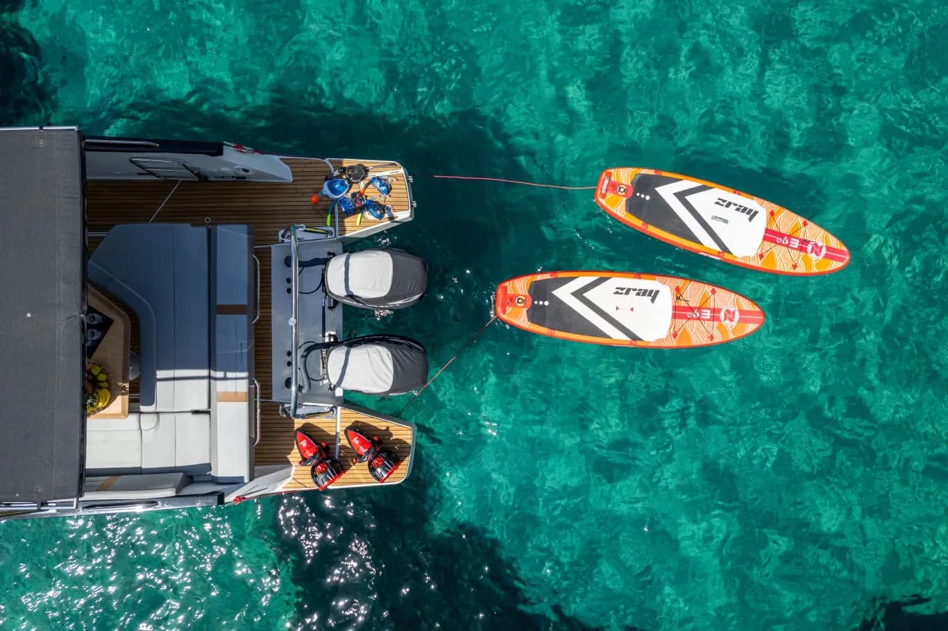 Private boat with paddleboards and seascooters — French Riviera