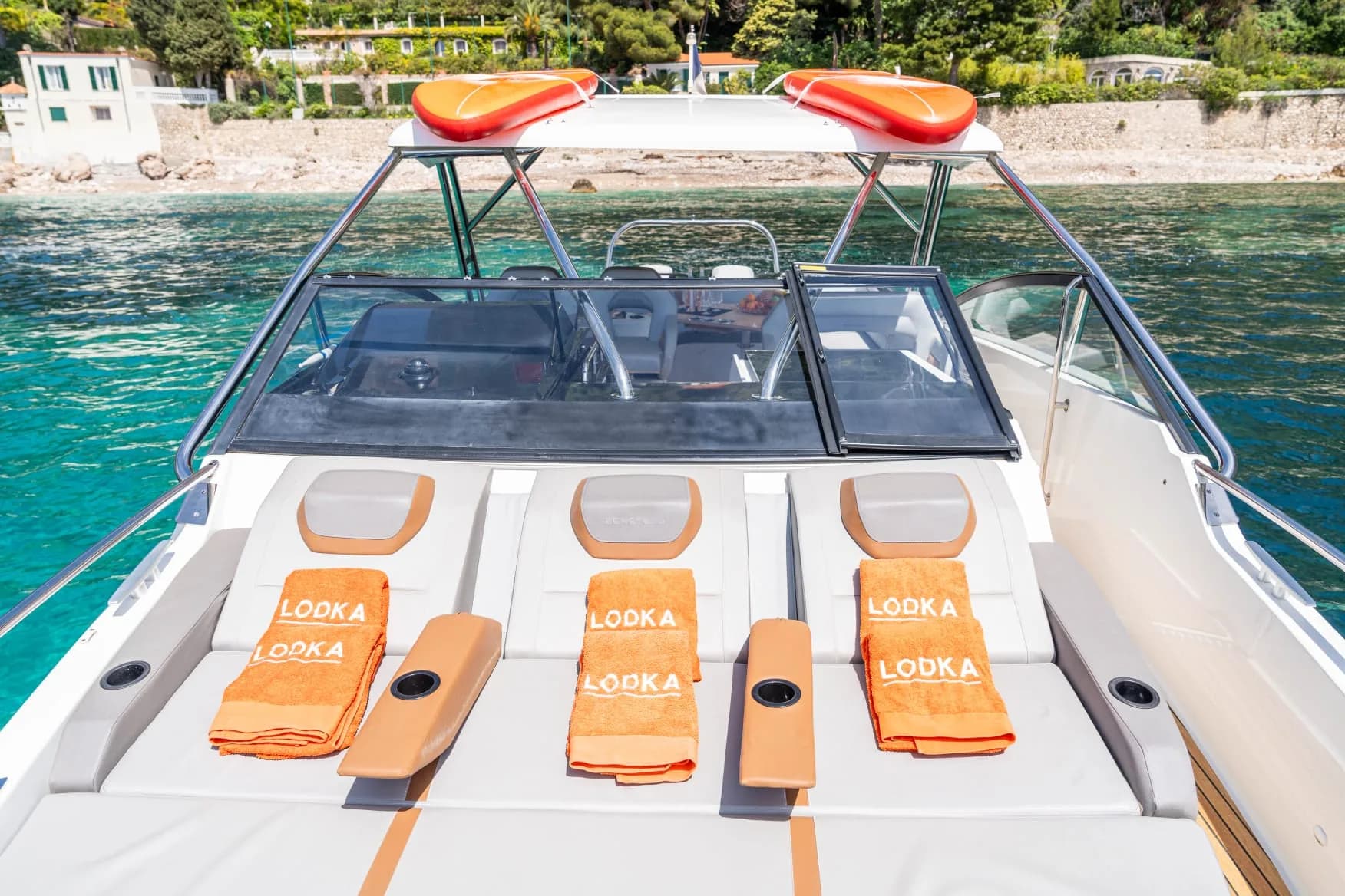 Front sundeck with branded beach towels ready for guests